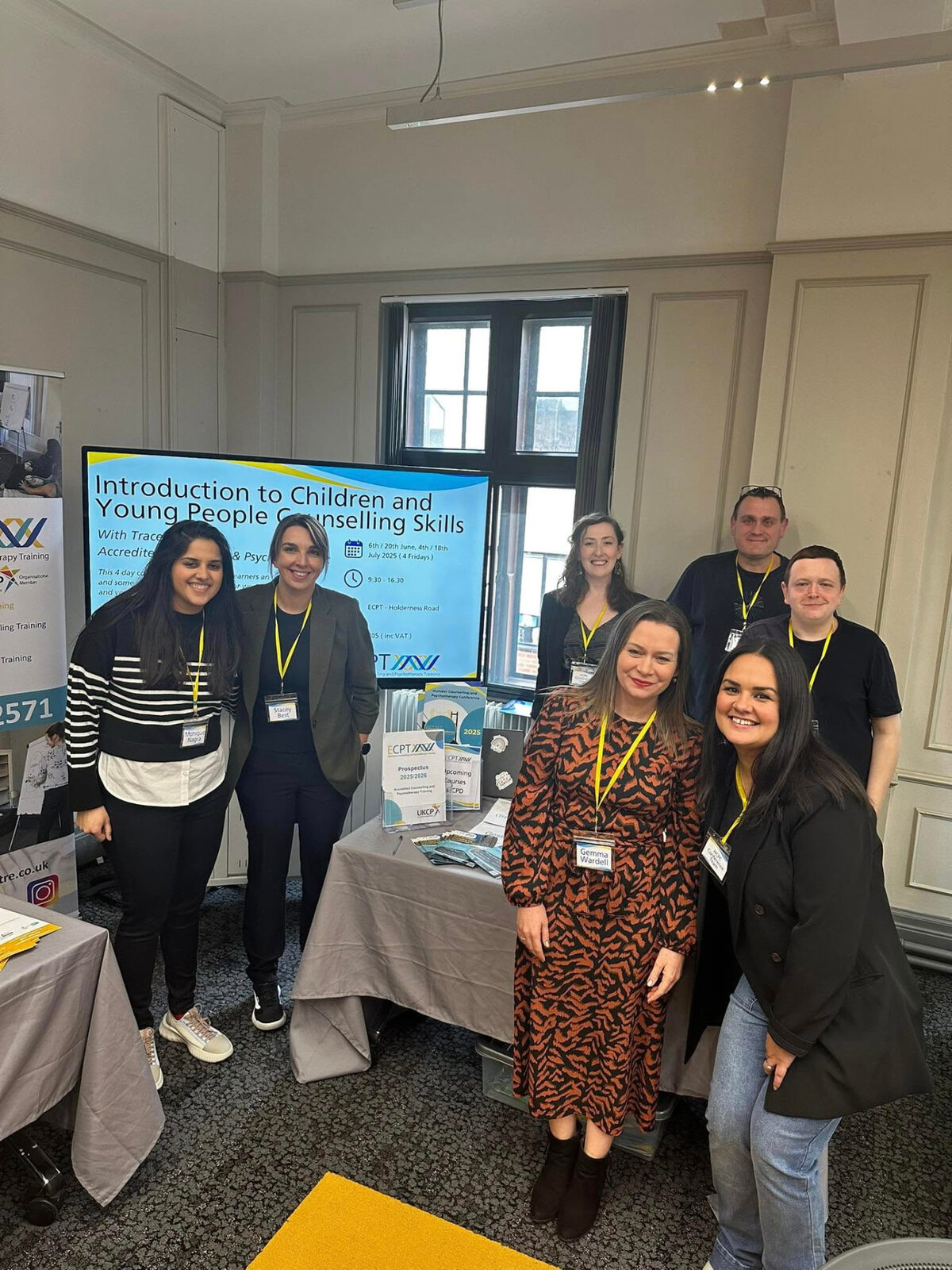 TALKINGWORKS team at an information stand